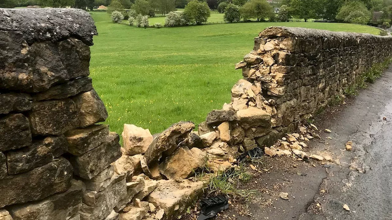 Cotswolds villagers' fury as historic dry stone wall is replaced with wooden fence by penny-pinching...