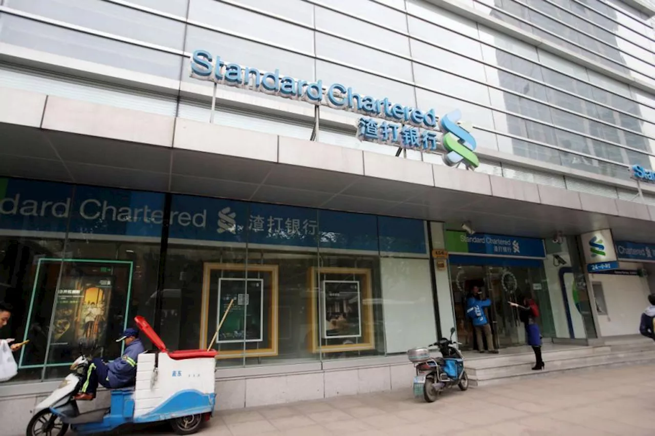 Standard Chartered shares tumble after profits hit by China charges