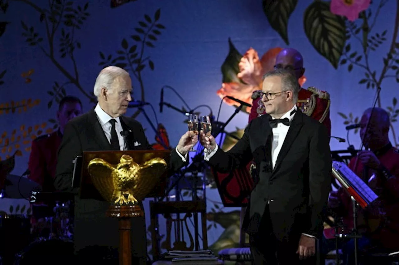 Biden, Australian PM toast ties in face of world crises