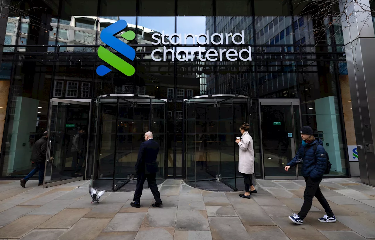 Standard Chartered shares slide 12% as China losses hit earnings