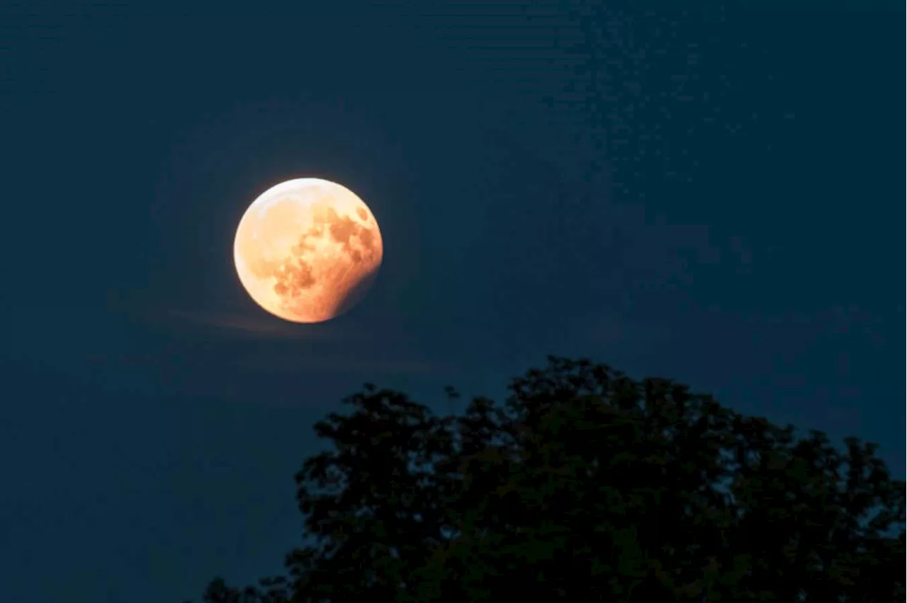 What time is the partial lunar eclipse of the full moon this weekend?