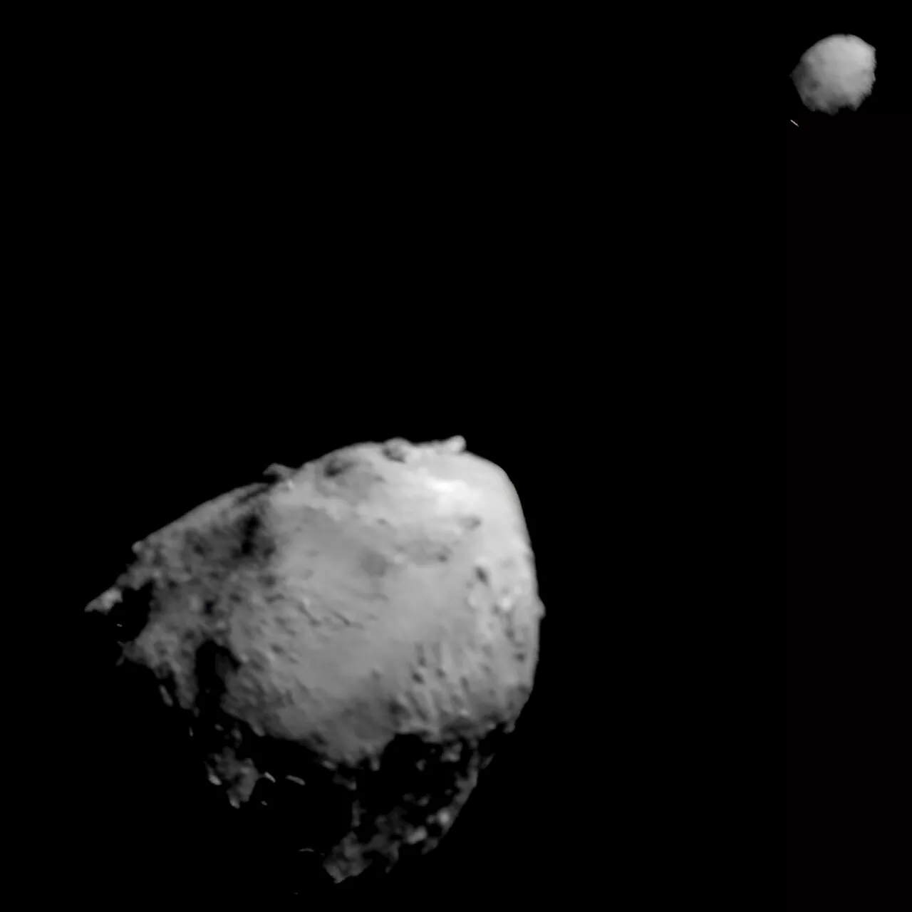 After DART smashed into Dimorphous, what happened to the larger asteroid Didymos?