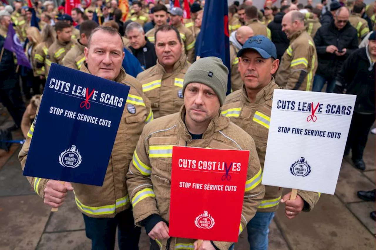 Firefighters' union protests outside Scottish Parliament over cuts