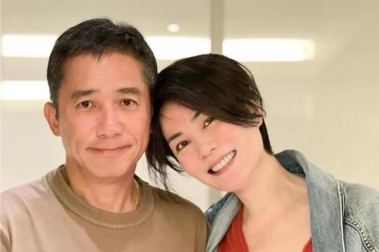 Actor Tony Leung and singer Faye Wong appear in rare photo together