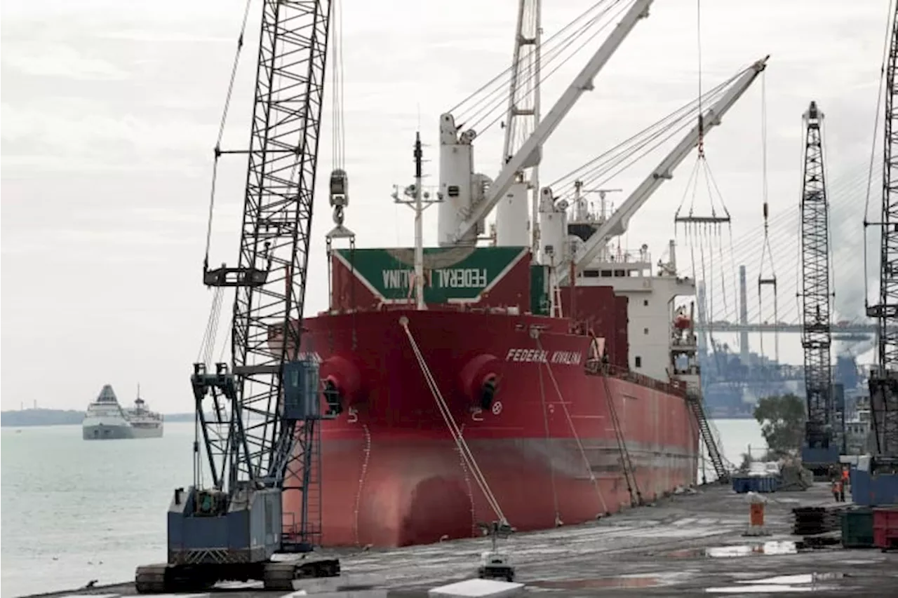 Strikers have shut down a vital Great Lakes shipping artery for days, and negotiations are looming