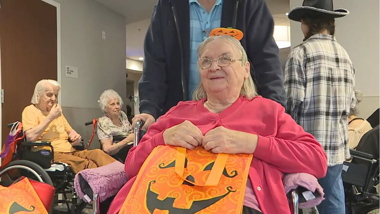 Rochester seniors relive youthful joy with RIT students' trick or treat event