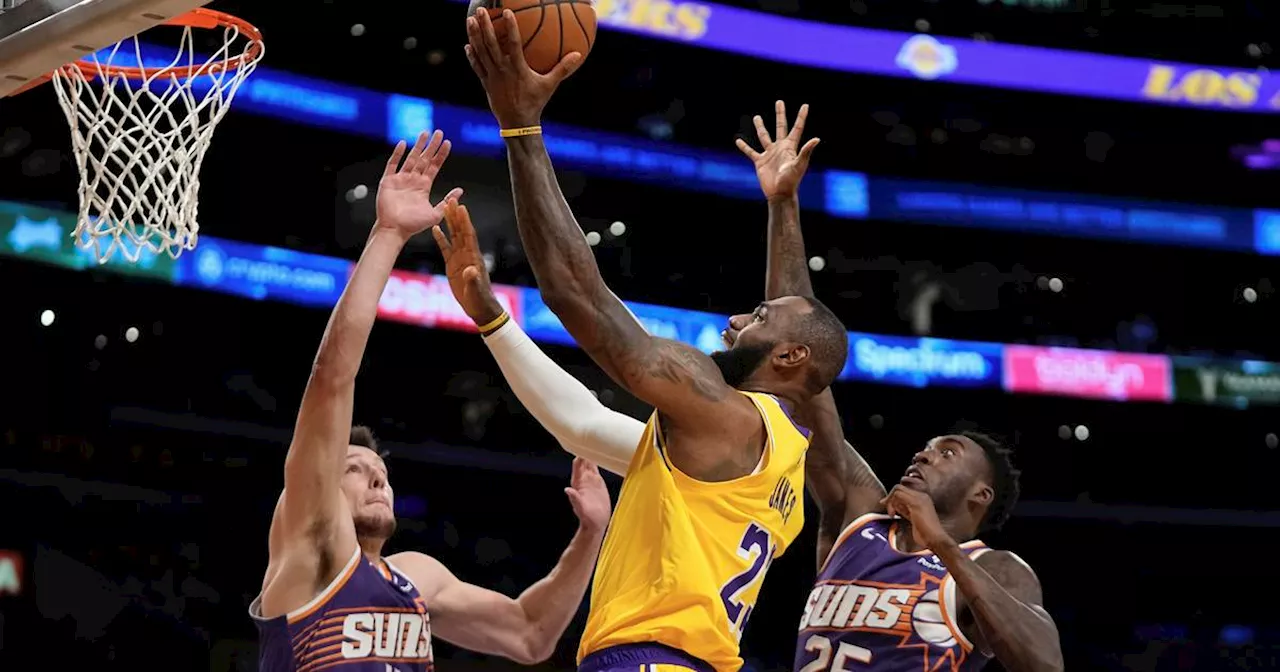 LeBron keys Lakers' 4th-quarter rally for 100-95 win over short-handed Suns