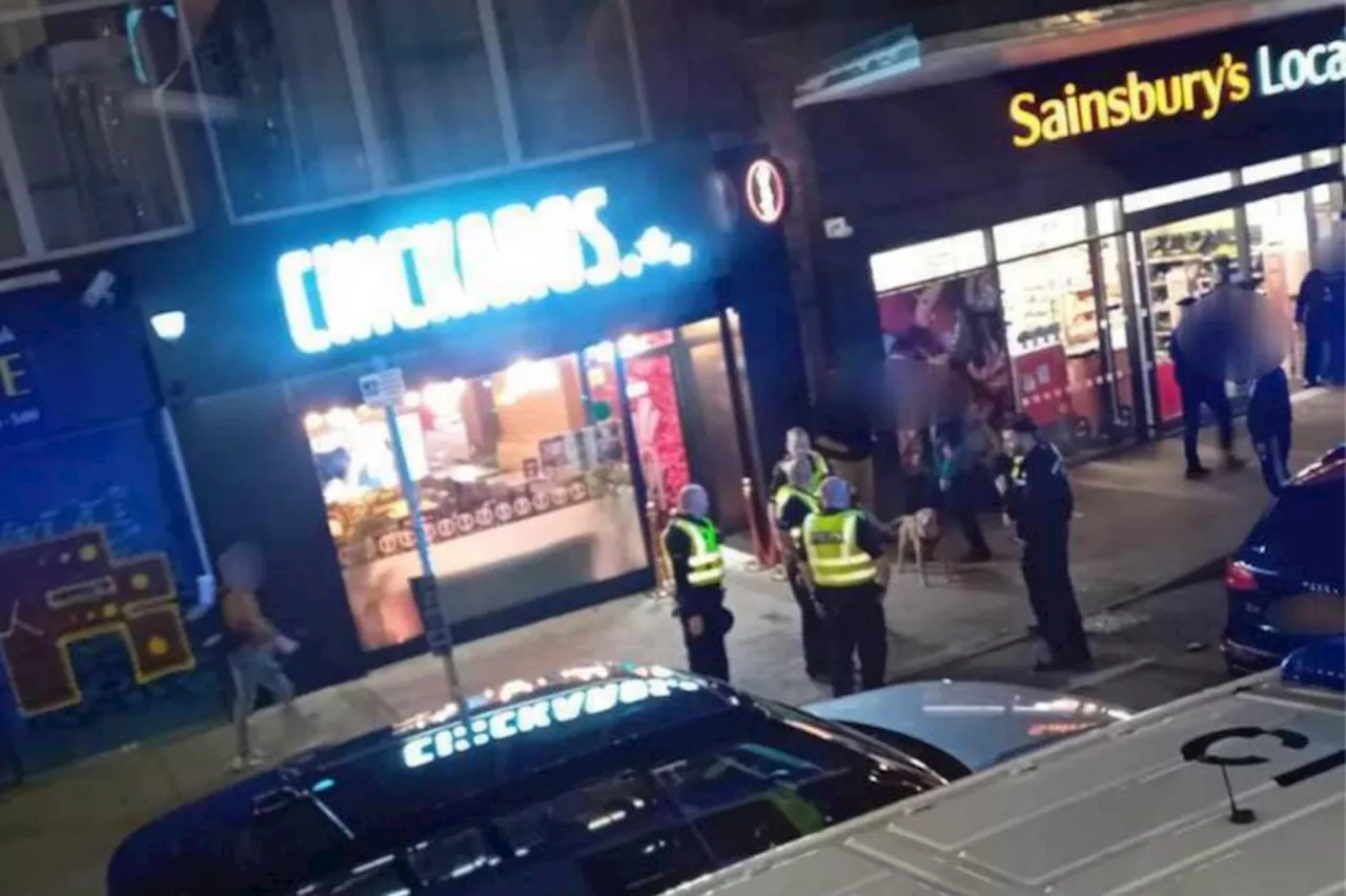 Two people arrested following disturbance in Glasgow shop