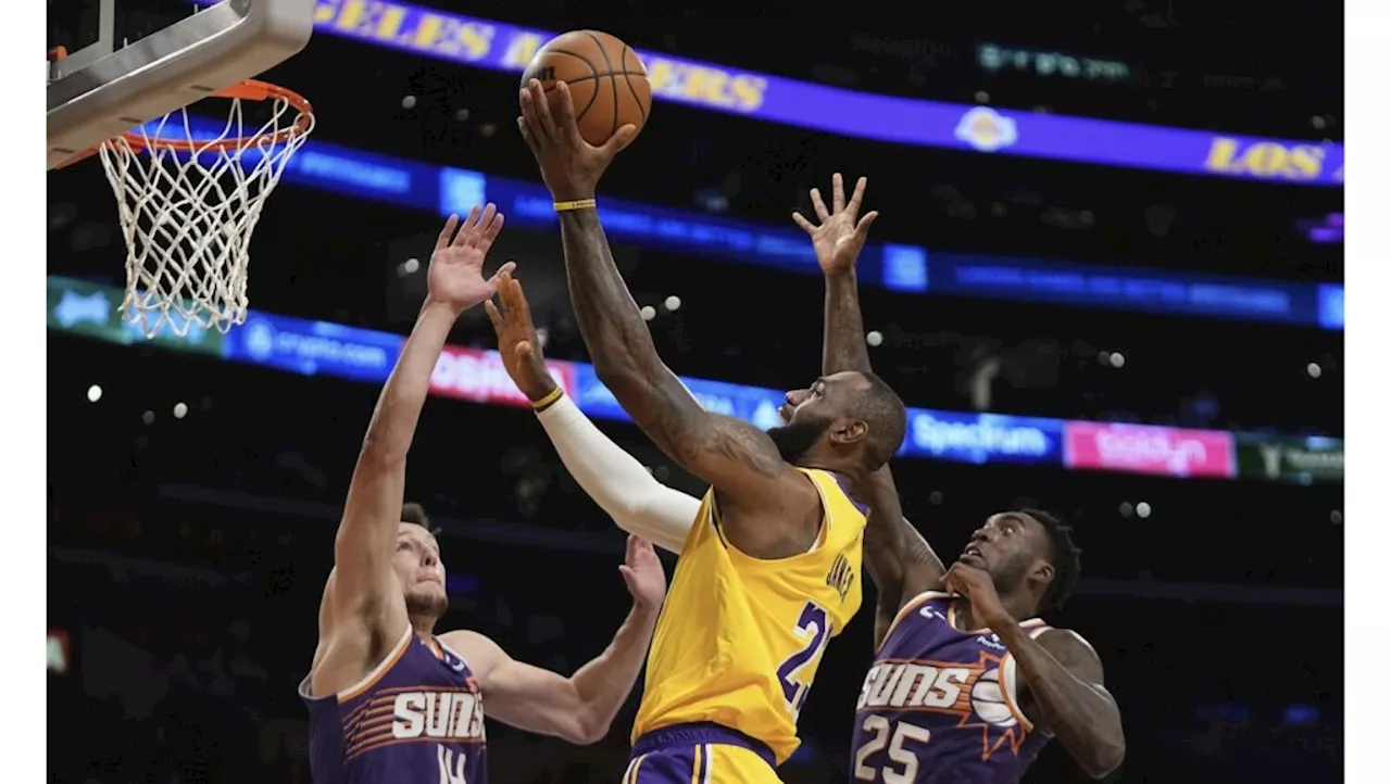 LeBron James fuels Lakers’ late rally to beat Suns in home opener