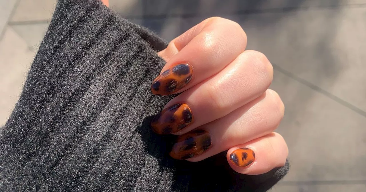 Paint the trending tortoiseshell nail look at home with our easy how-to guide