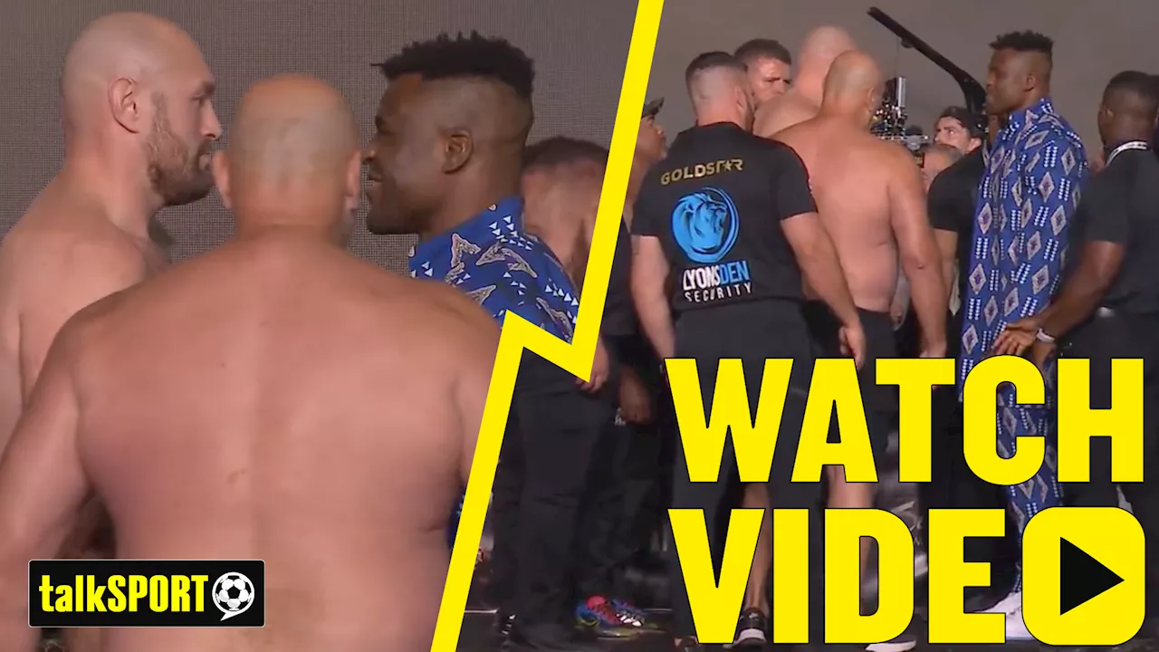 Security intervene as John Fury rips shirt off and joins Fury and Ngannou staredown