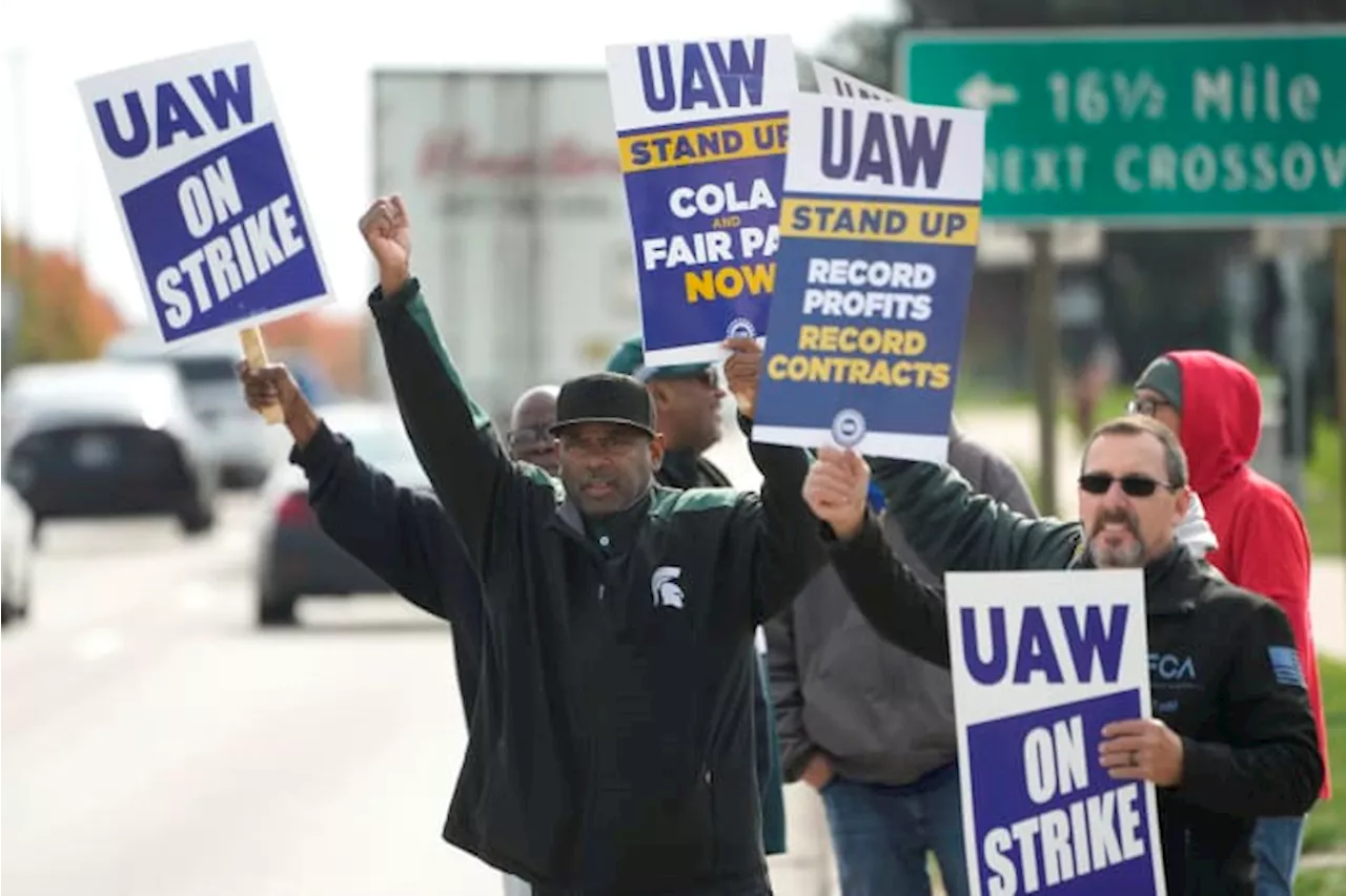 AP Sources: United Auto Workers and Stellantis reach tentative contract that follows model Ford set