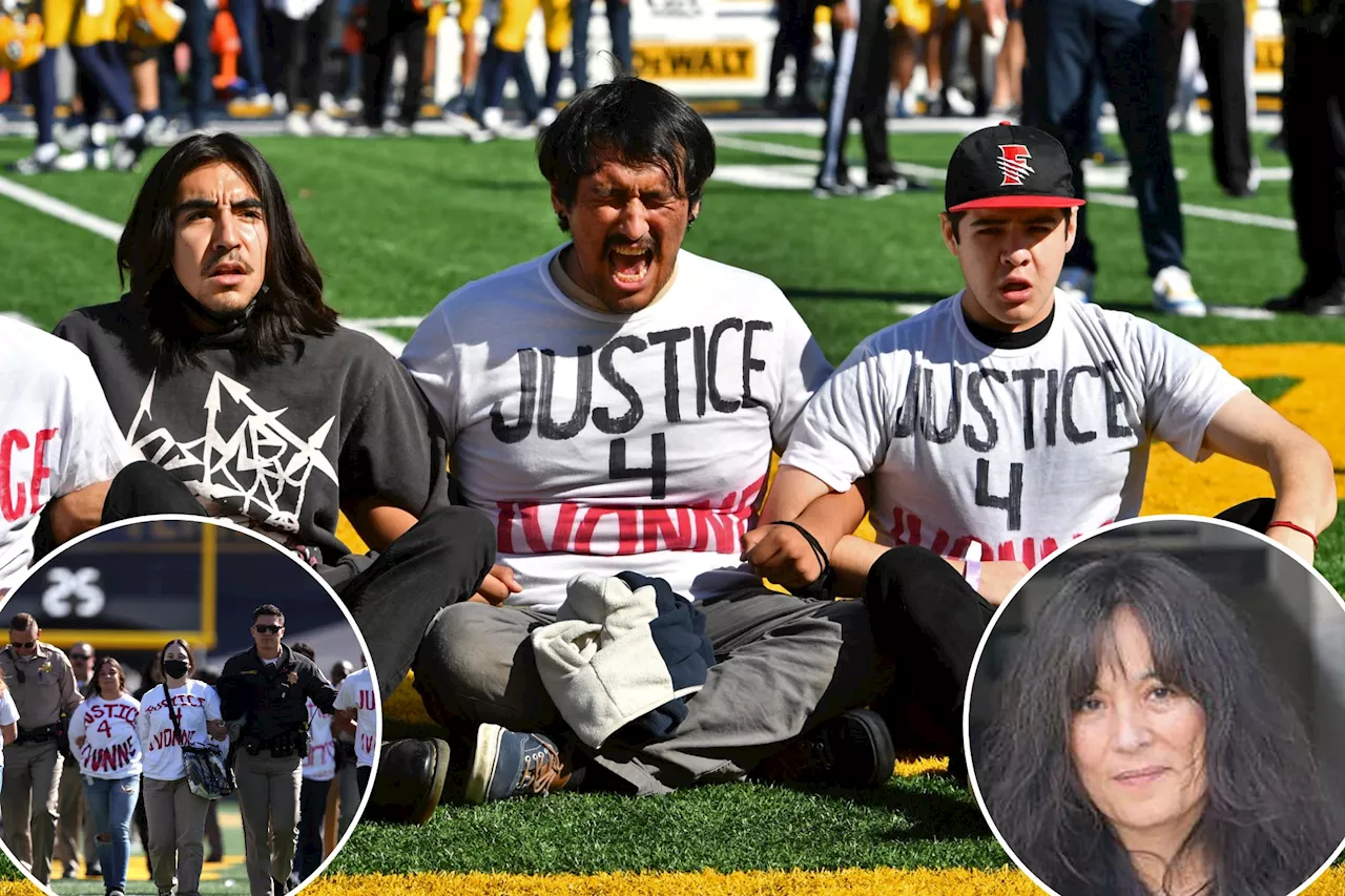 Protesters sit at 50-yard line, delay Cal-USC game over professor's reported stalking suspension