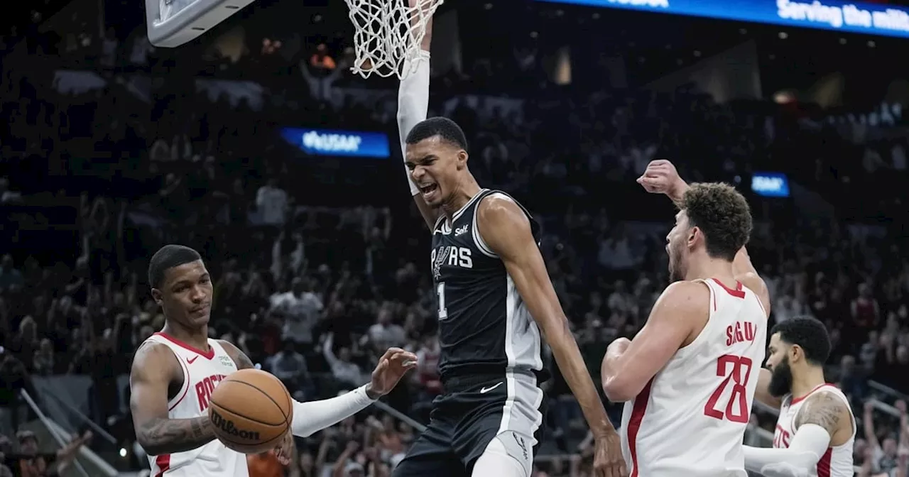 Wembanyama earns 1st NBA win, Spurs top Rockets