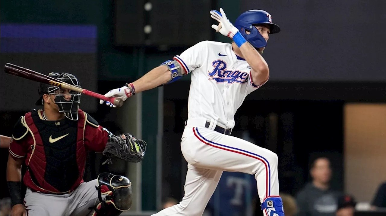 Rangers rookie Evan Carter makes historic World Series debut - then drills an RBI double