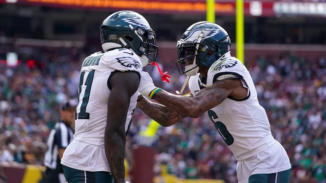 Hurts throws for 4 TDs on injured knee to help the Eagles beat the Commanders and improve to 7-1