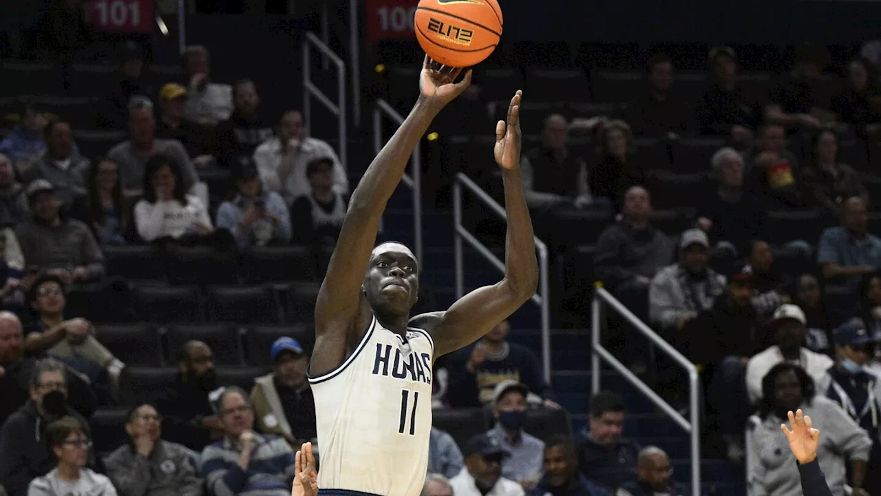 West Virginia forward Akok Akok released from hospital after collapsing on court during exhibition