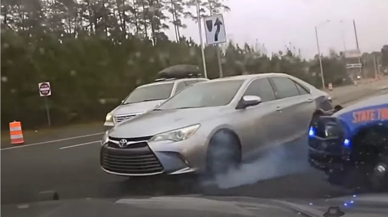 Watch Police Chase Allegedly Stolen Toyota Camry At 130 MPH In The Wet