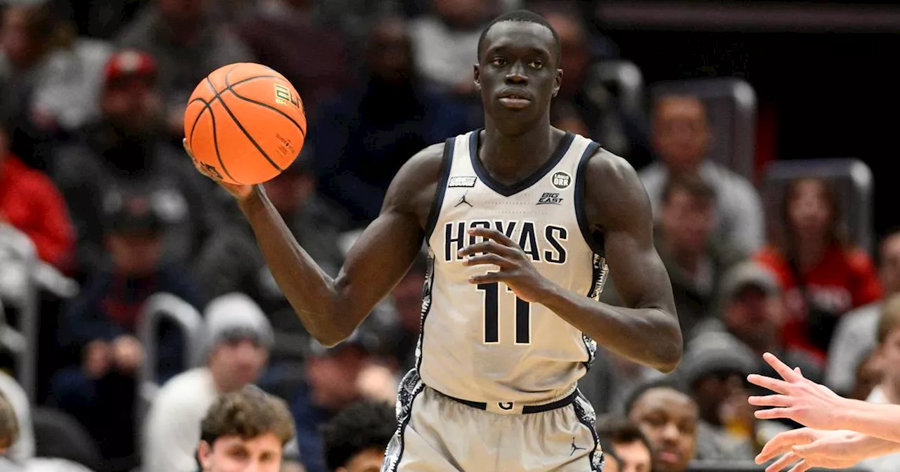 West Virginia basketball player Akok Akok is released from the hospital after collapsing on the court