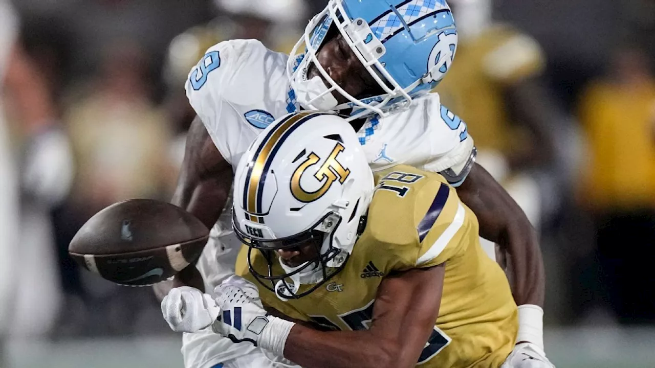 North Carolina's Tez Walker in hospital after blindside hit