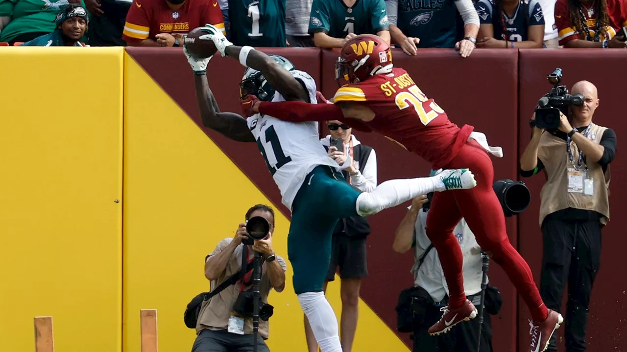 AJ Brown sets NFL record as Eagles use second-half surge to beat Commanders