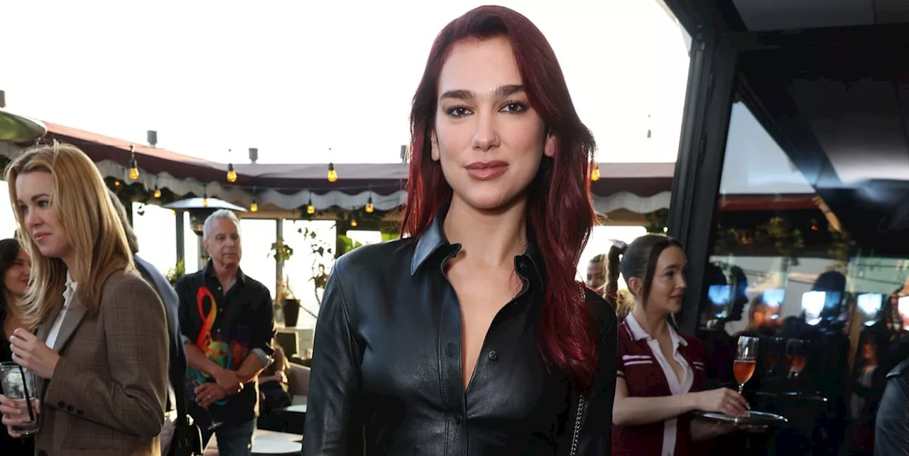 Dua Lipa Pairs Her Fiery Red Hair With a Black Leather Shirt Dress