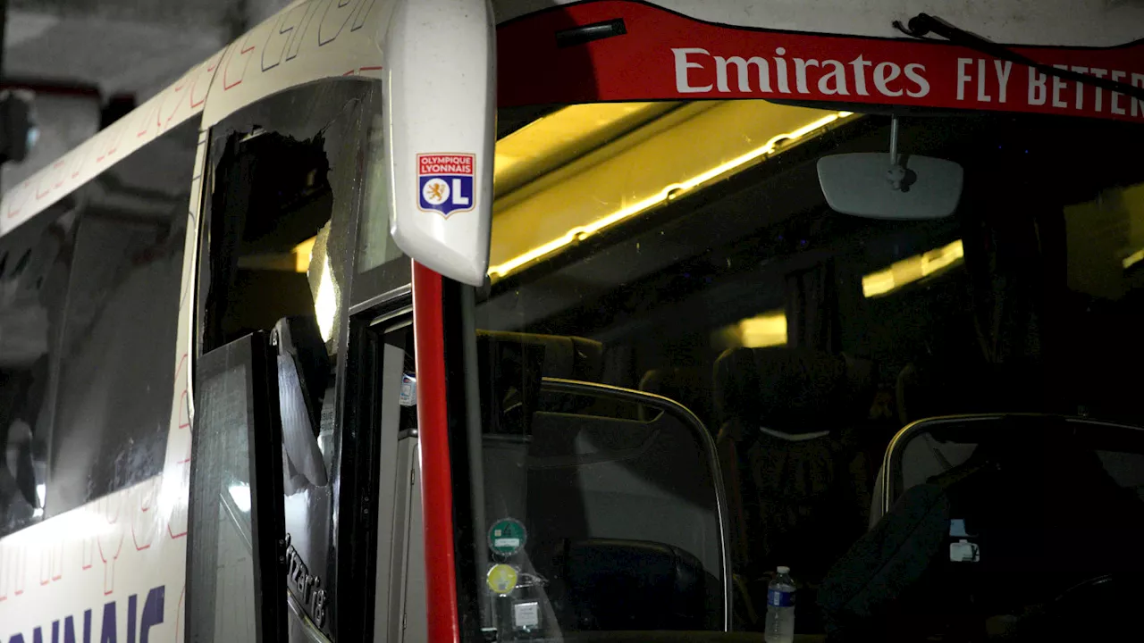 Lyon coach left with bloodied face after team bus attacked before league game at Marseille