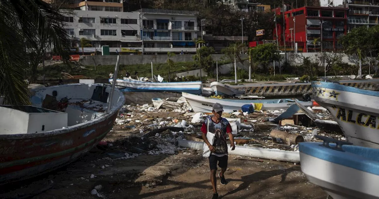 Mexico hurricane deaths rise to 39 as searchers comb debris with the toll expected to rise