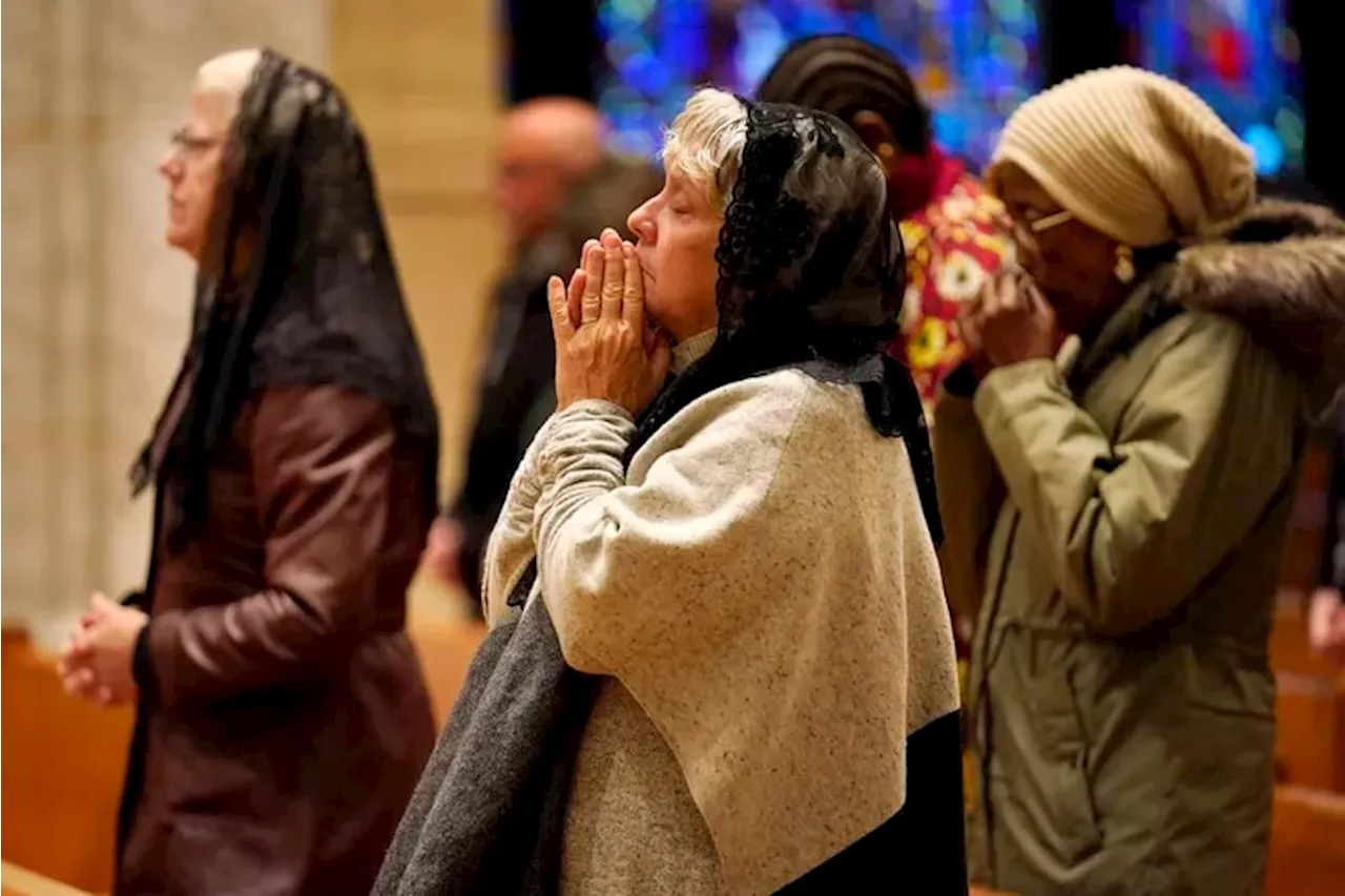 Mainers gather for Sunday mass to pray, reflect days after a mass shooting left 18 dead