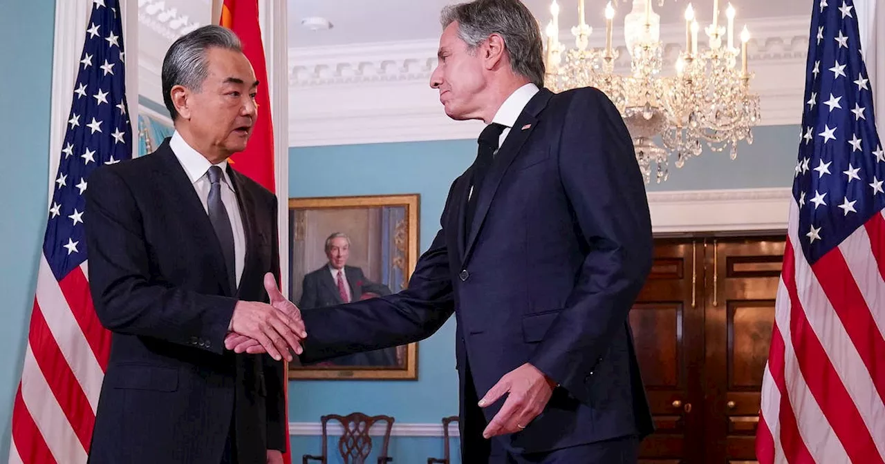 China's Foreign Minister warns of challenges ahead for Xi-Biden meeting