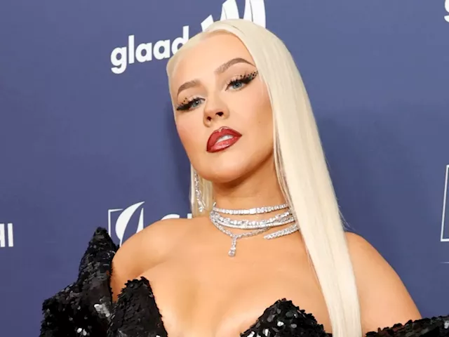 Christina Aguilera honors Burlesque costar Cher with stunning Halloween  costume: 'Tess & Ali 4EVER