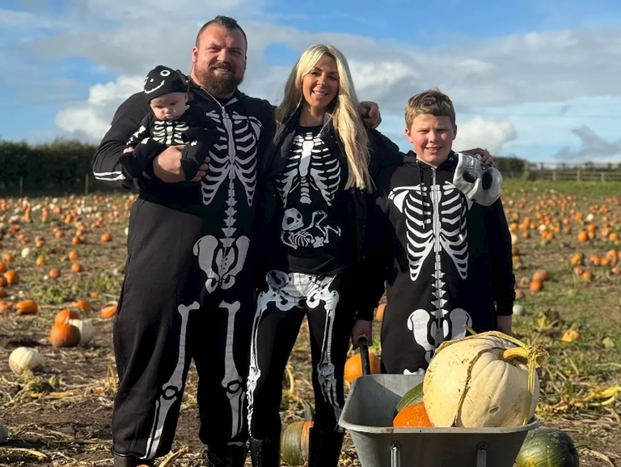 Former World's Strongest Man and family visit fruit farm