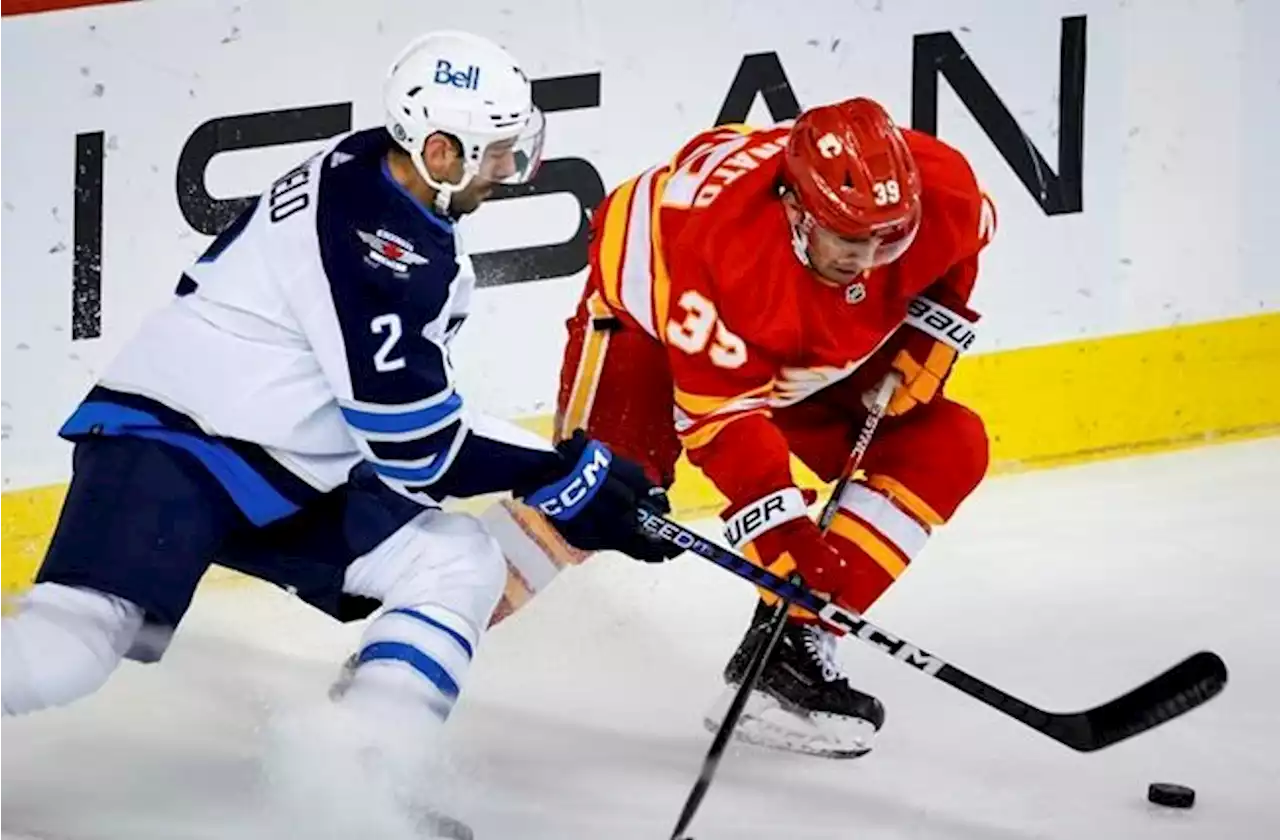 Flames rally from 3-1 deficit to ground Jets 5-4 in pre-season play