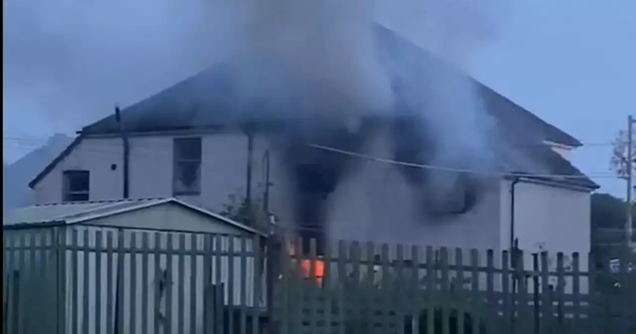 Flames rip through Scots home with smoke over football stadium visible for miles