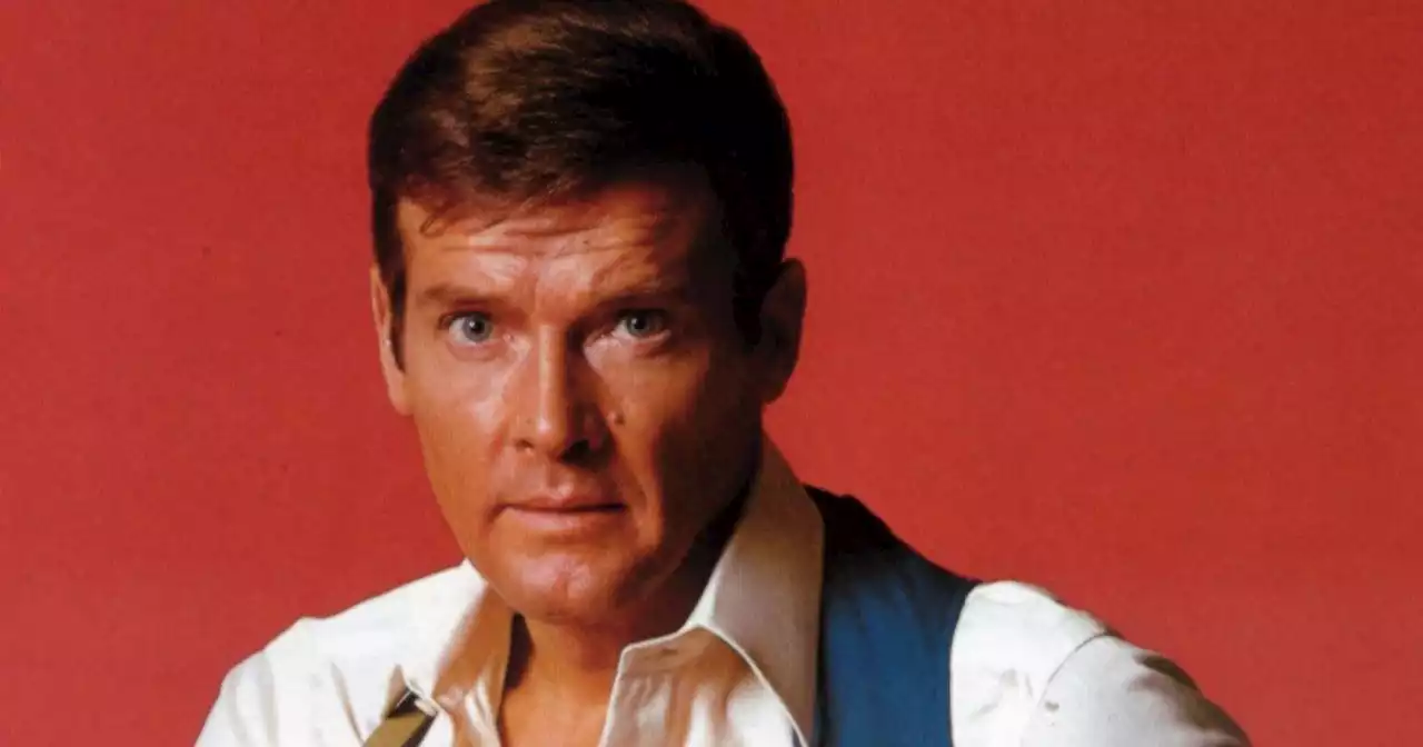 Sir Roger Moore's son's resemblance to late James Bond actor at auction launch