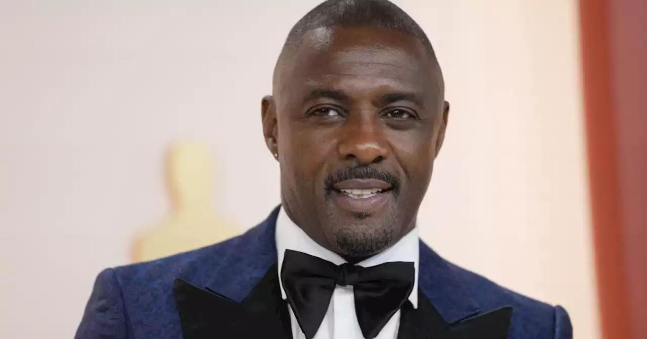 Idris Elba says he's an 'absolute workaholic' and is dealing with it by going to therapy