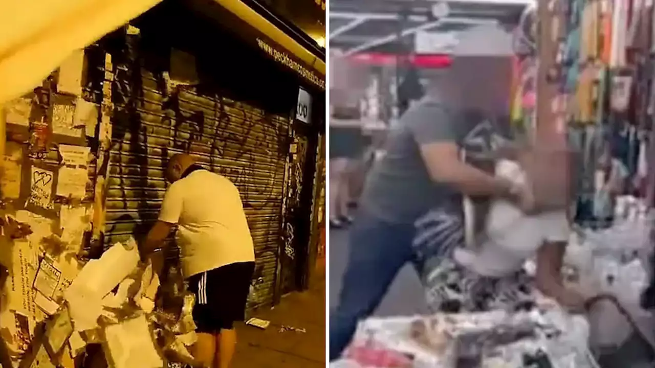 Mysterious figure seen taking down protest signs from store where shopkeeper filmed 'throttling' suspected shoplifter