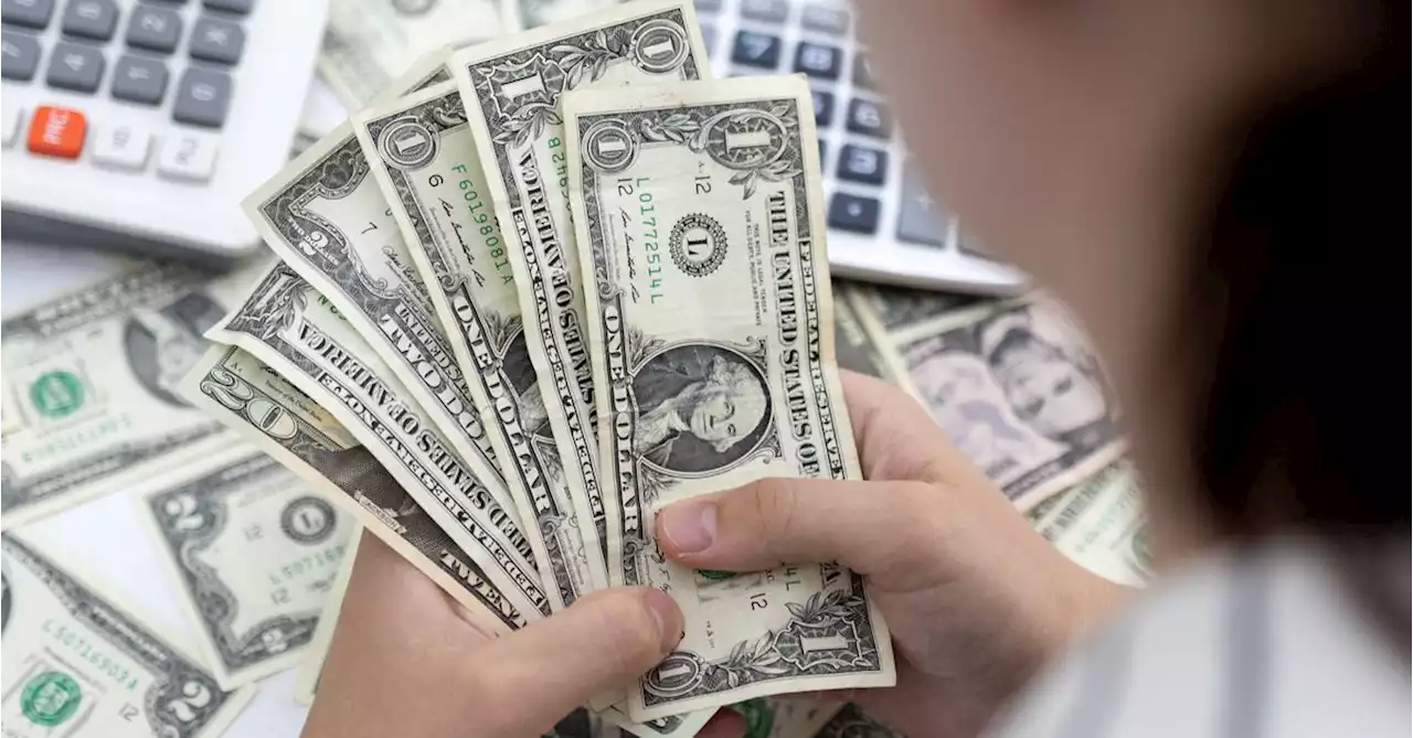 Dollar hits new high on upbeat data, yen teeters near intervention line