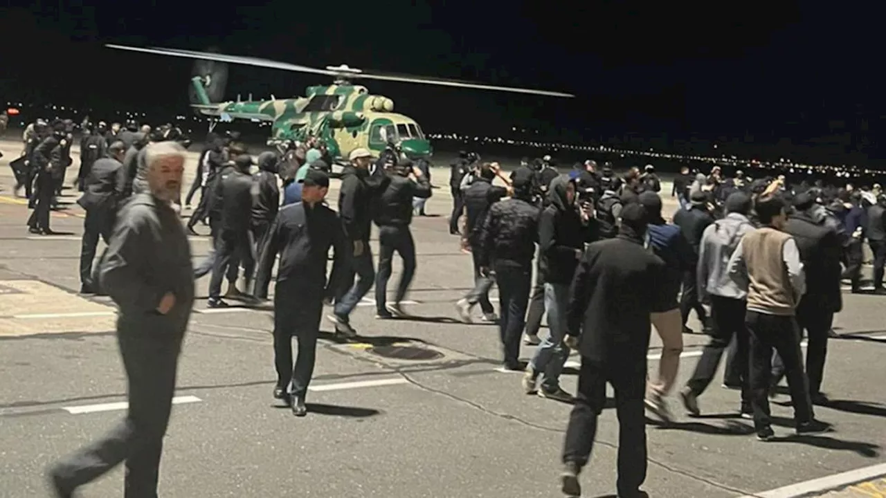 Hundreds storm Russian airport in anti-Semitic riot over arrival of plane from Israel