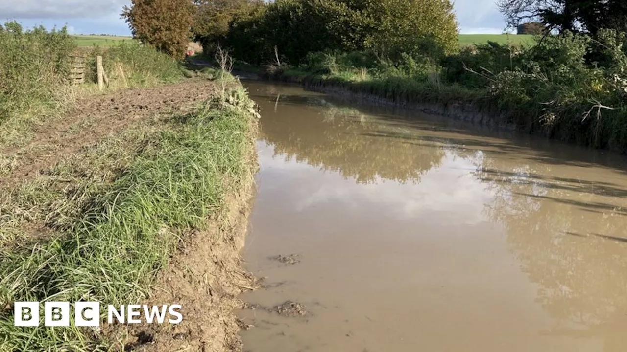 Avebury: road still flooded two weeks after storm Babet