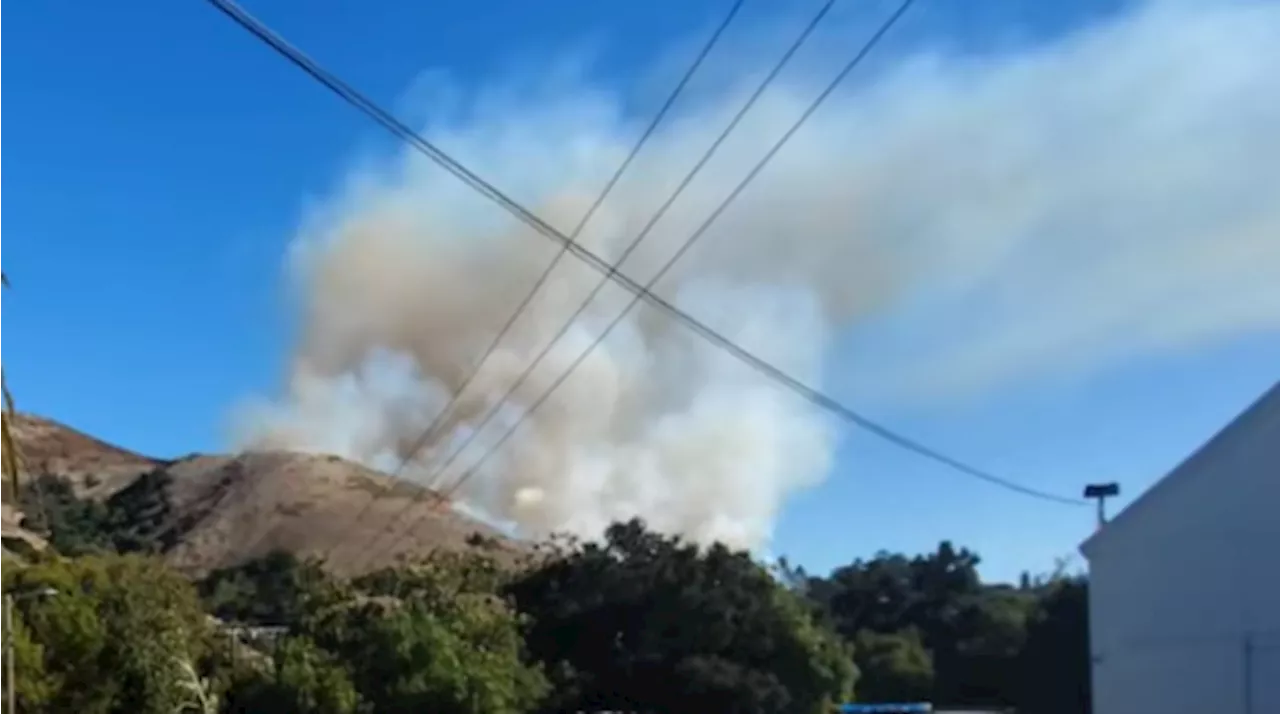 Fire burning behind San Luis Obispo High School