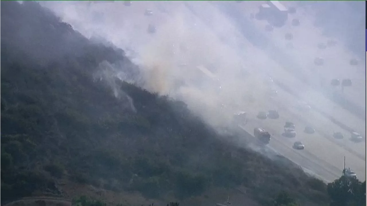 Large plumes of smoke seen from a brush fire in Rancho Bernardo