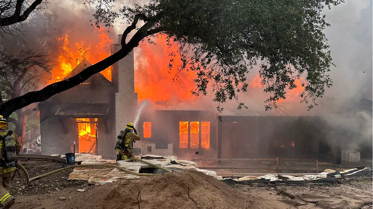 Crews battling 'intense' fire at 2-story house under construction in SW Austin, power temp