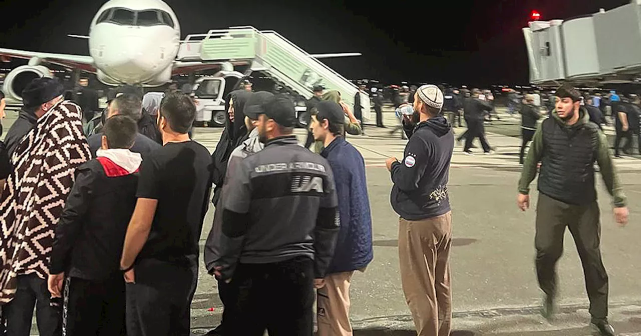 Hundreds storm airport in Russia in antisemitic riot over arrival of plane from Israel