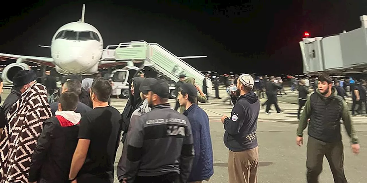 Hundreds storm airport in Russia in antisemitic riot over arrival of plane from Israel