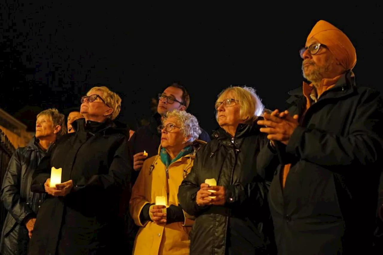 Candle-lit cathedral vigil calls for ‘human solidarity’ amid conflict