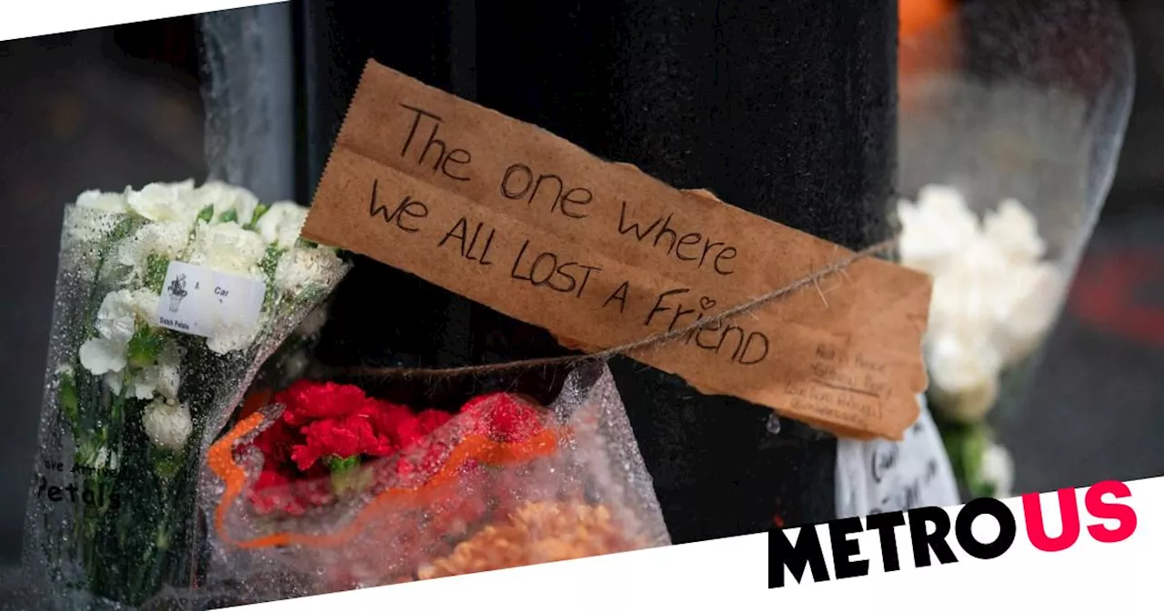 Mourners gather to lay flowers and tributes outside Matthew Perry's home