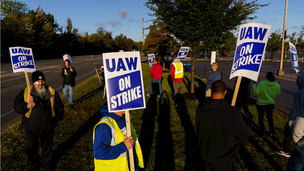 UAW announces deal with General Motors that tentatively ends strikes against Detroit automakers