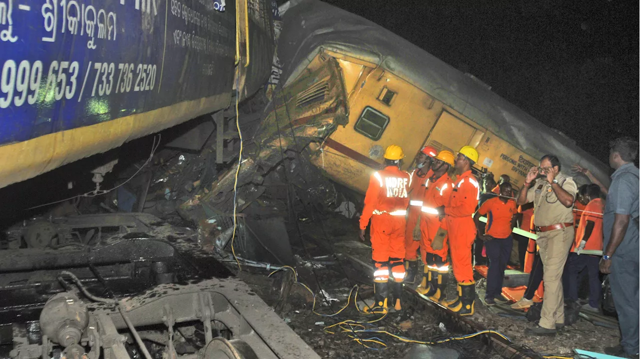 A passenger train slams into another in southern India, killing 13 people