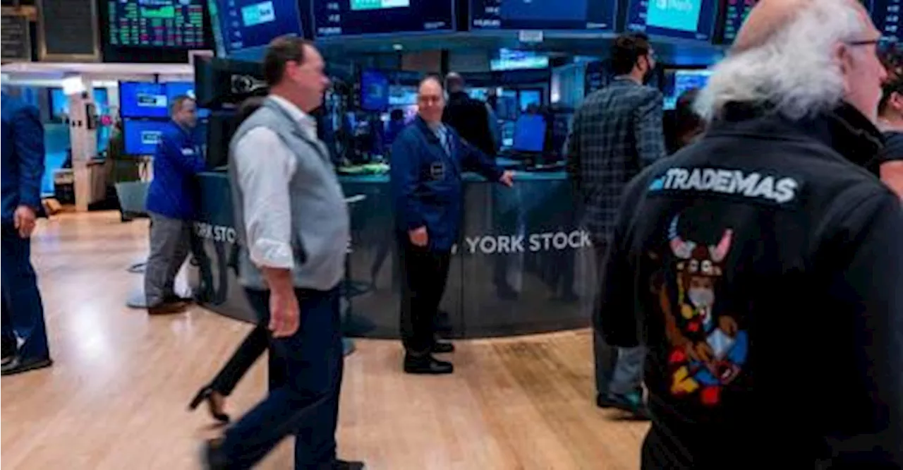 Wall Street ends sharply higher, powered by earnings momentum